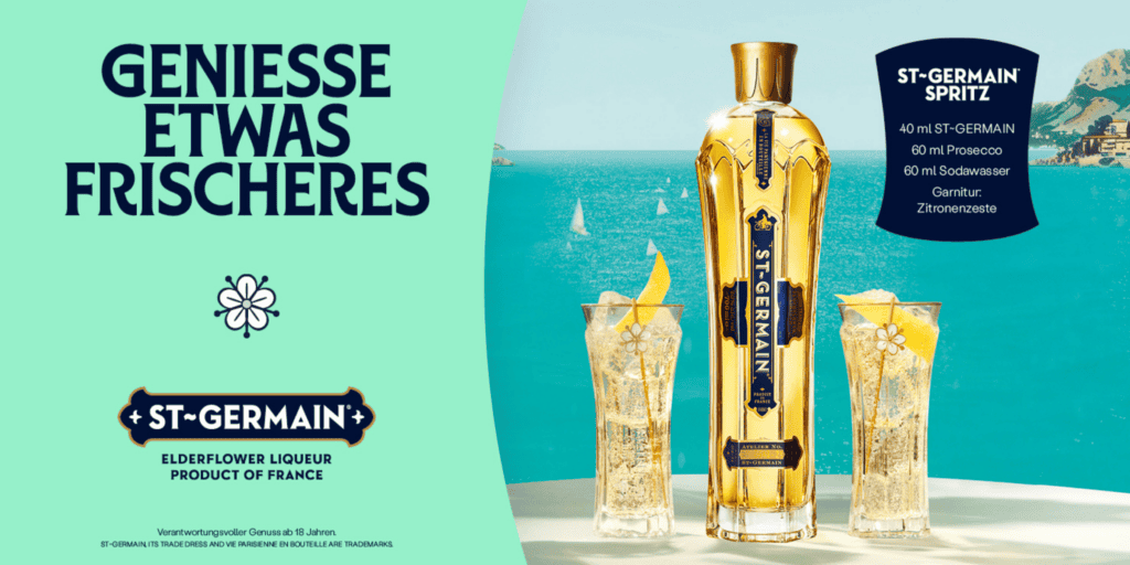 St-Germain Spritz mit Holunderblütenlikör, Prosecco, Soda und Zitronenzeste